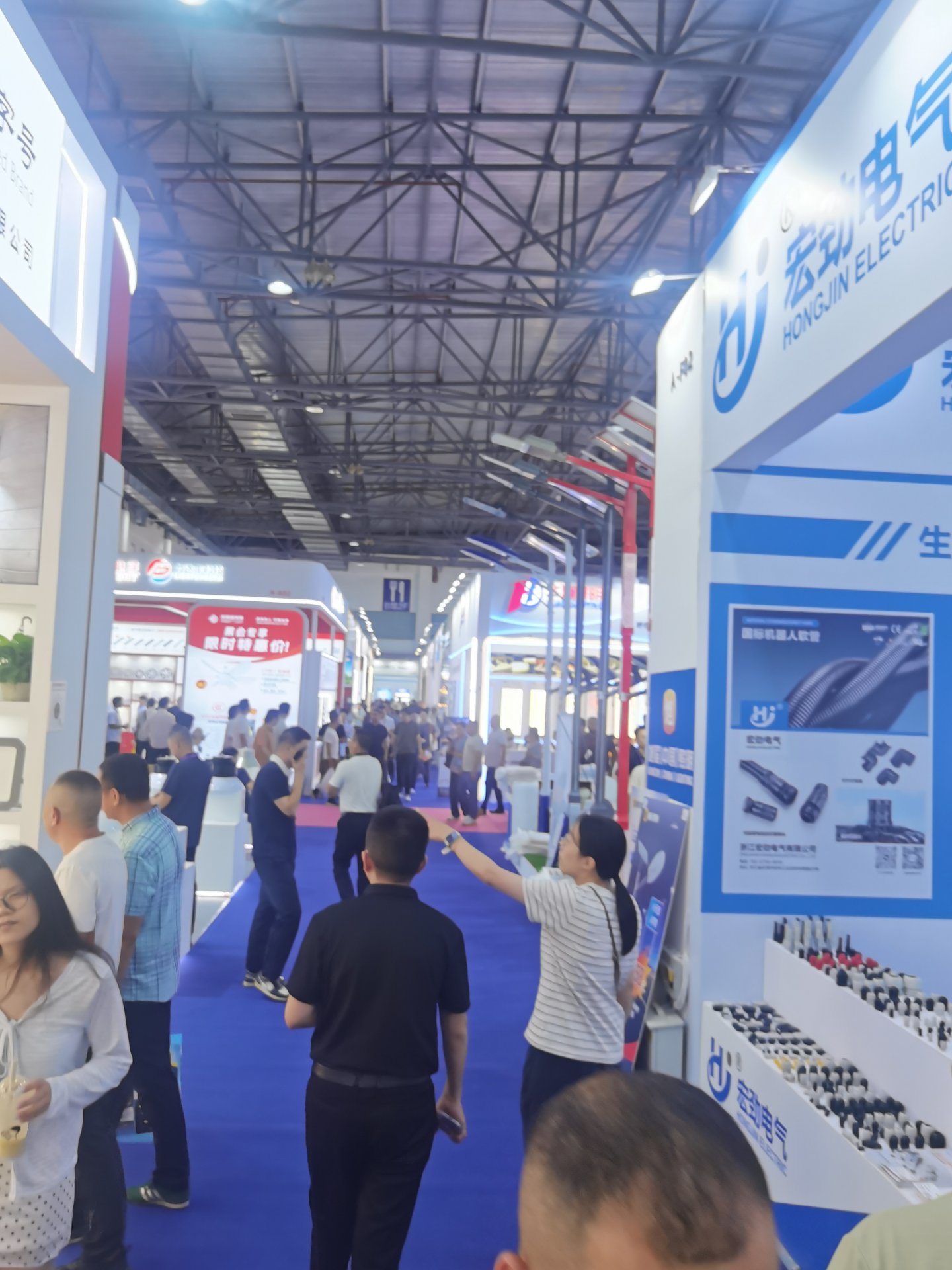 Exhibit aisles in the main venue with outdoor and accessory suppliers
